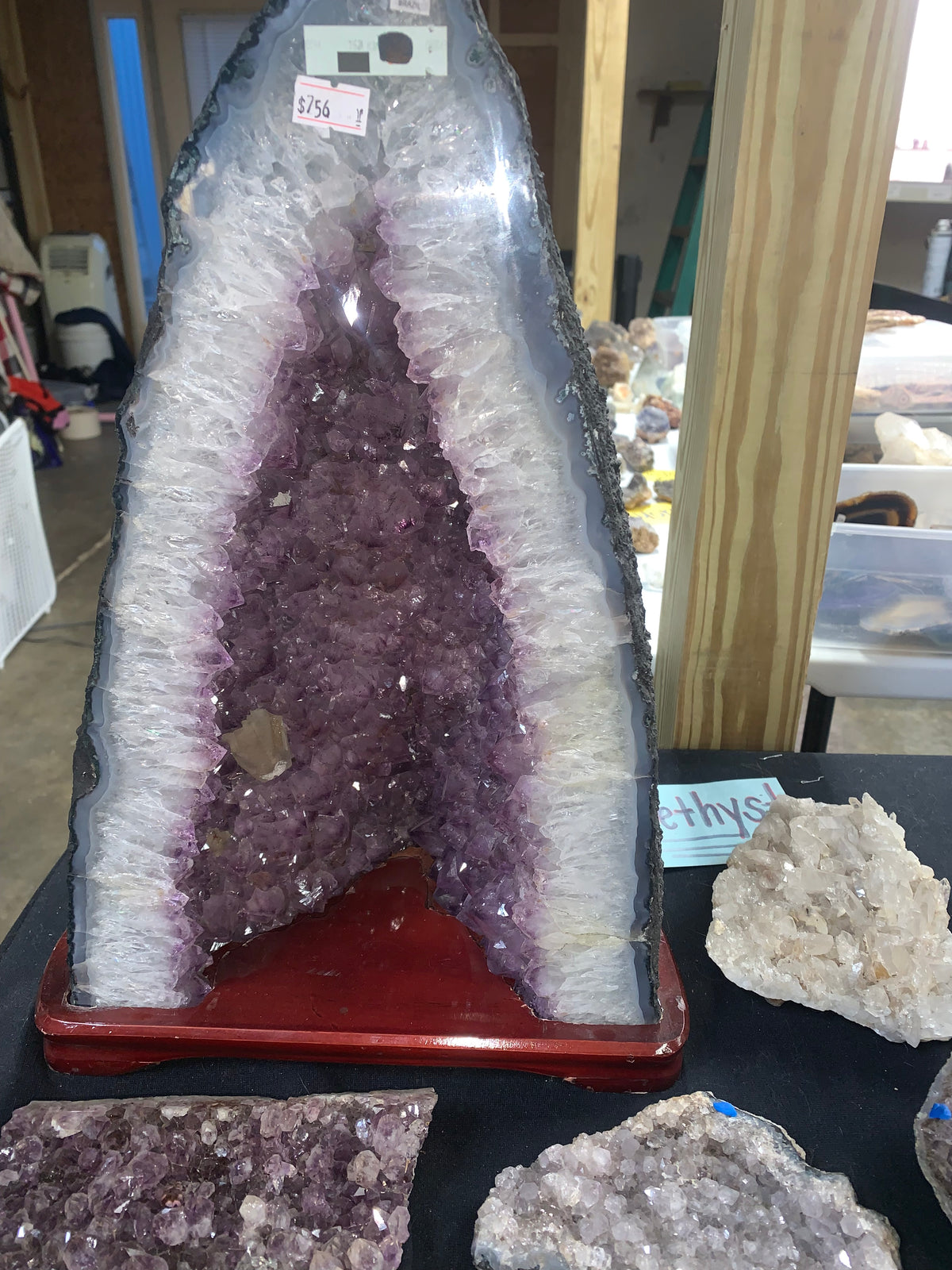 Amethyst cathedral geode showing natural outer matrix and crystal interior