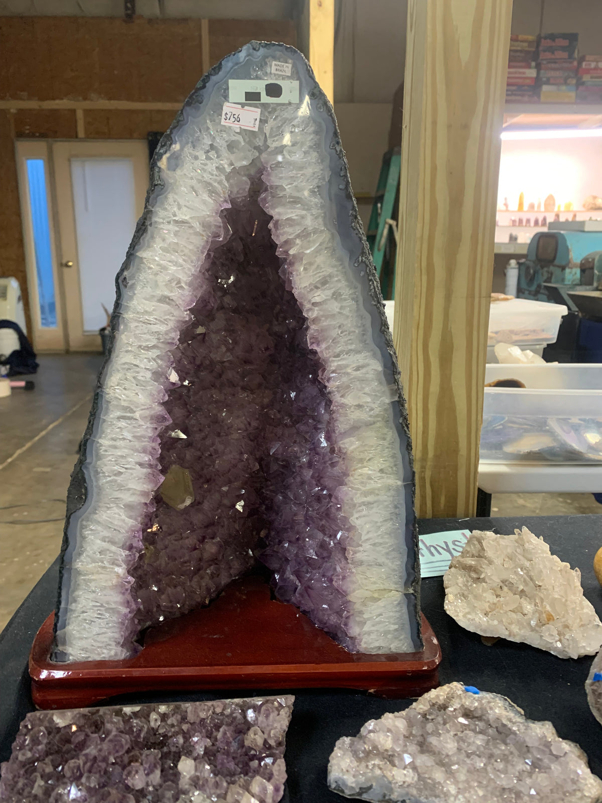 Deep purple natural amethyst cathedral geode with contrasting calcite crystal growth and pale agate banding at Earthforged Rock Shop.