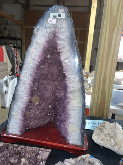 1. Detailed view of sparkling purple quartz crystals inside amethyst cathedral