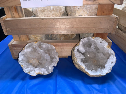 Opened Moroccan quartz geodes showing sparkling white crystal interiors