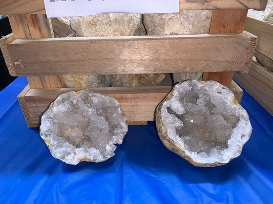 Opened Moroccan quartz geodes showing sparkling white crystal interiors