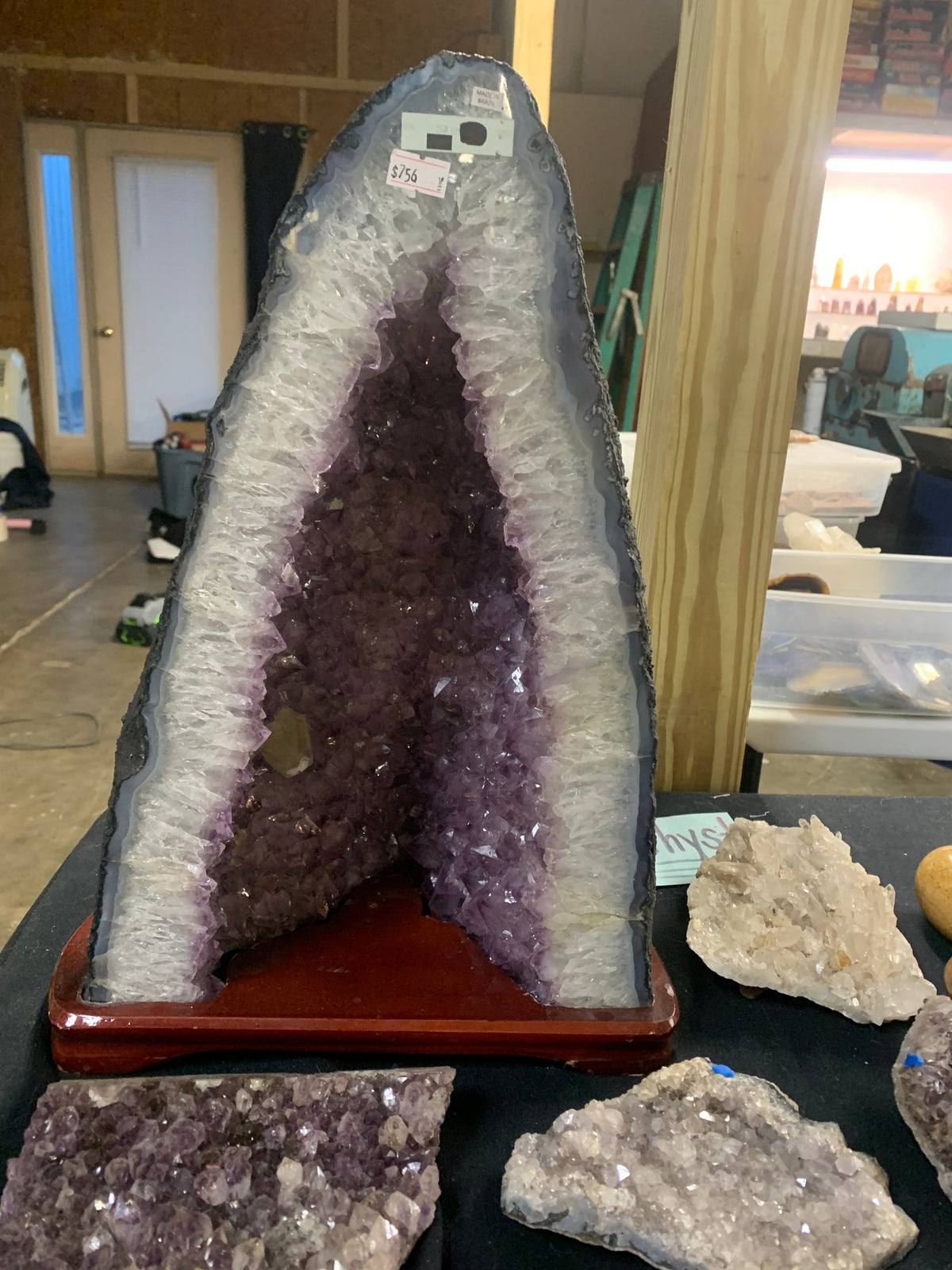 Front view of natural amethyst cathedral geode showing crystal-lined interior