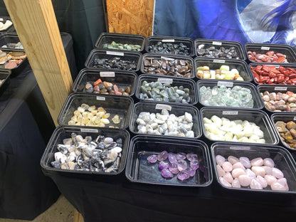 Selection of colorful polished gemstones and tumbled stones available at Earthforged Rock Shop.