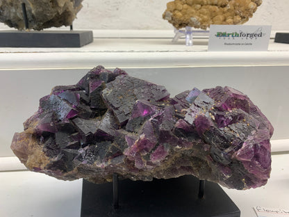 Deep purple Elmwood fluorite crystal specimen from Tennessee on natural matrix
