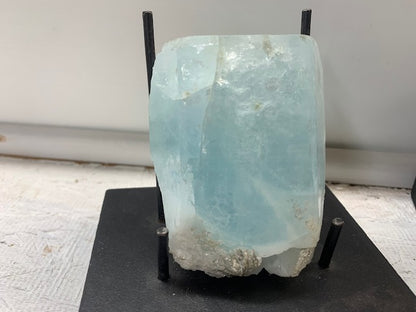 Natural aquamarine beryl crystal collector specimen with pale blue coloration and mineral matrix