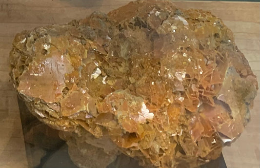 Large natural wulfenite collector specimen weighing 1,732 grams with abundant yellow-orange crystal growth on matrix at Earthforged Rock Shop.